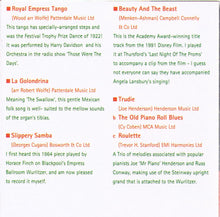 ROBERT WOLFE "While The Music Plays On" GRCD 65